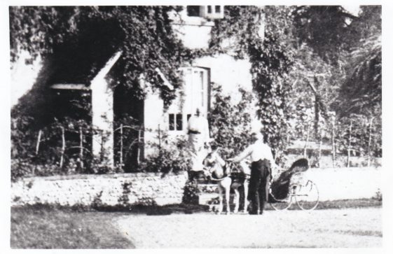 Black and white photograph of Meadowside. Miss Hagen in her donkey cart  - tended by her gardener/handyman - Mr Gaiger circa 1925